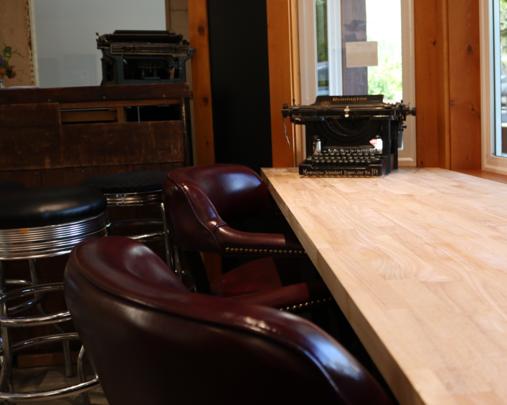 leather brown chairs with vintage typewriter